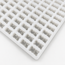 Close-up of a 2.3mL gummy bear silicone mold with 230 cavities on a clean white background