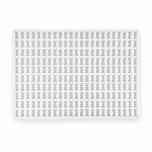 Top view of a 2.3mL gummy bear silicone mold with 230 cavities on a clean white background