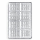 Clear custom polycarbonate chocolate mold with 64 tree-shaped cavities